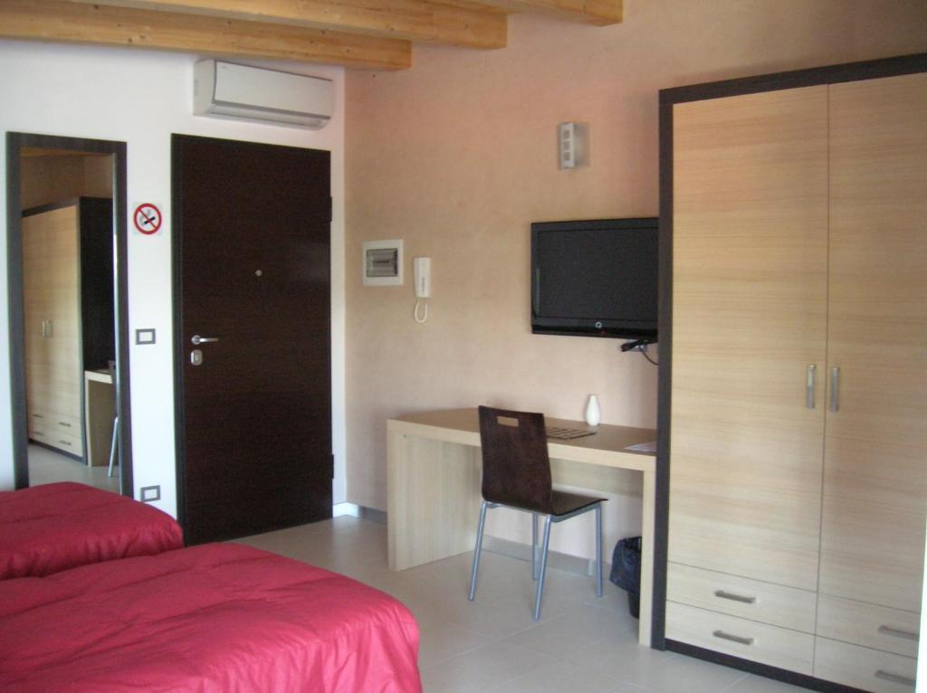 BE HOME Fiera Pero Zimmer foto